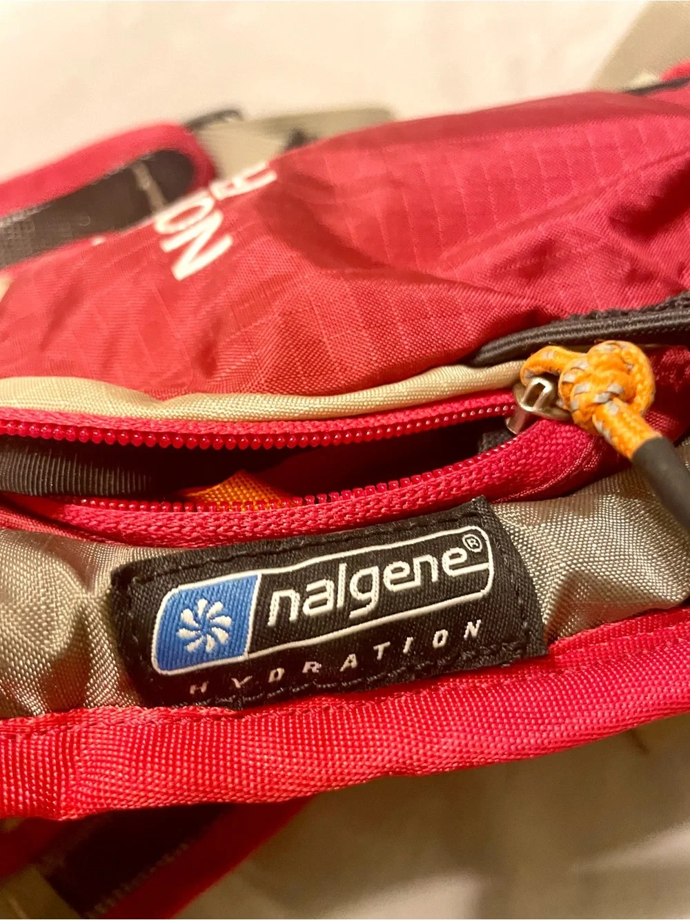 The North Face Red and Tan Hydration Vest Pack